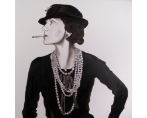 Painting of Coco Chanel in profile wearing a hat and pearls and holding a cigarette, by Kim Parrent